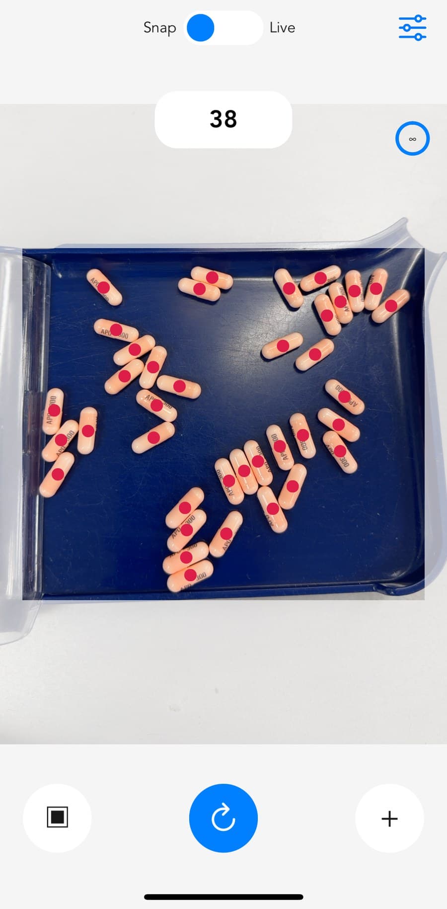 pillphill counting a tray of tablets